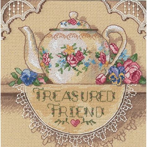 Vintage cross stitch chart and remaining threads of a Beguiling tiger. . Gold collection cross stitch